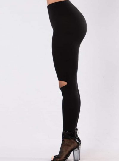 Snygga svarta leggings med hål för knäna från sidan